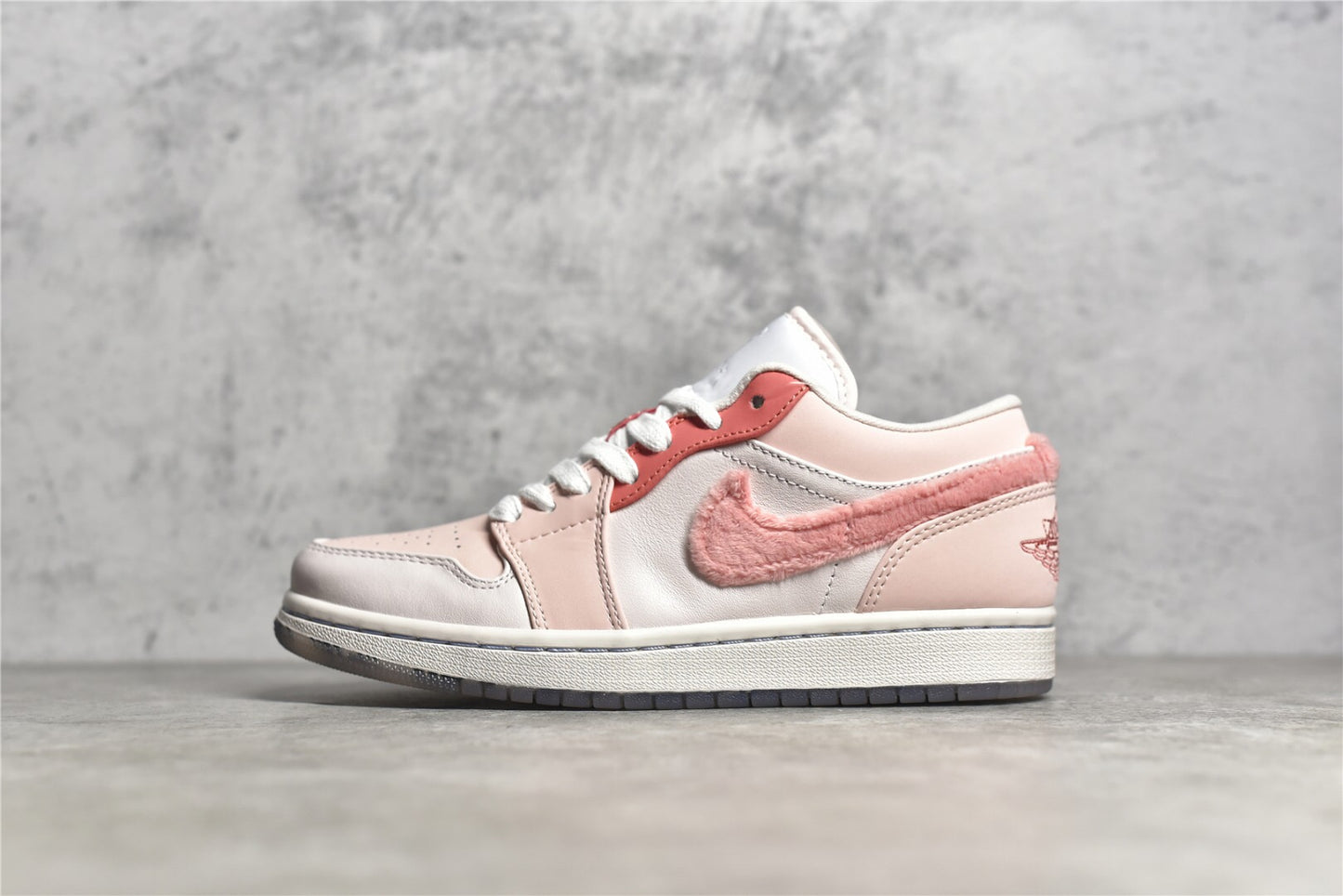 Jordan 1 Low SE Mighty Swooshers Pink