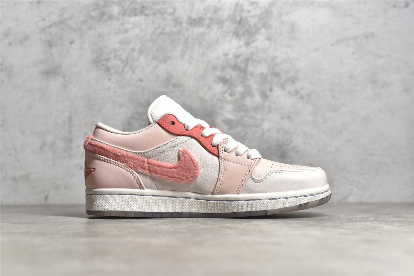 Jordan 1 Low SE Mighty Swooshers Pink