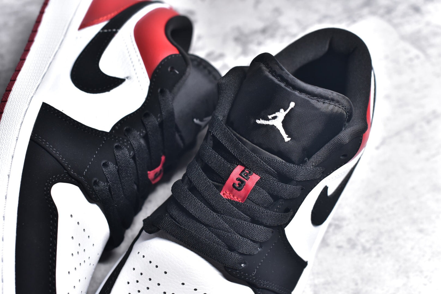 Jordan 1 Low Black Toe